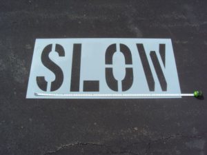 SLOW-Parking-lot-Stencil